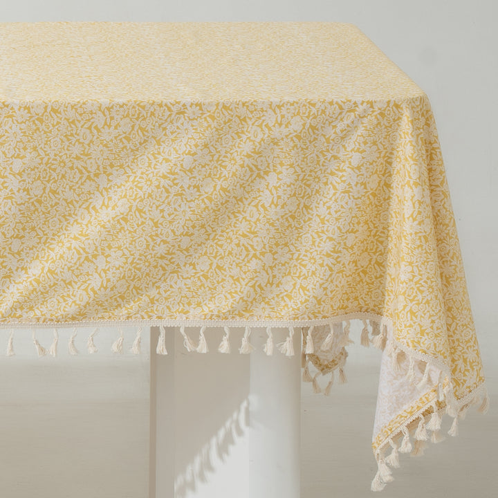 Rectangular tablecloth with floral Millefleurs print and cotton tassels