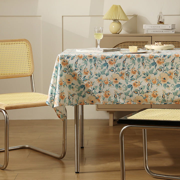 Wipeable tablecloth made of polyester with floral watercolor look and water-repellent coating