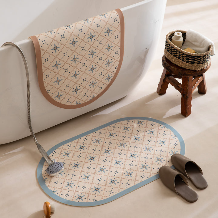 Oval wipeable placemat with tulip pattern, padded edge and non-slip bottom
