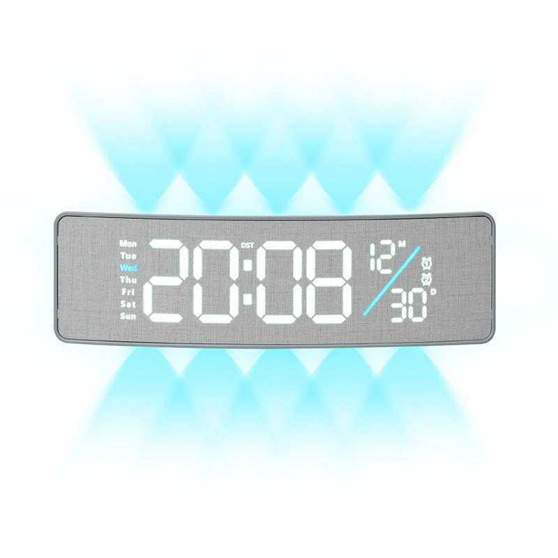 Digital display alarm clock with weekday display and temperature