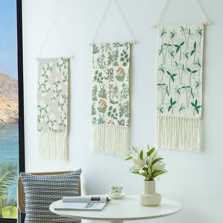 Woven wall hanging with floral jacquard structure and long fringes