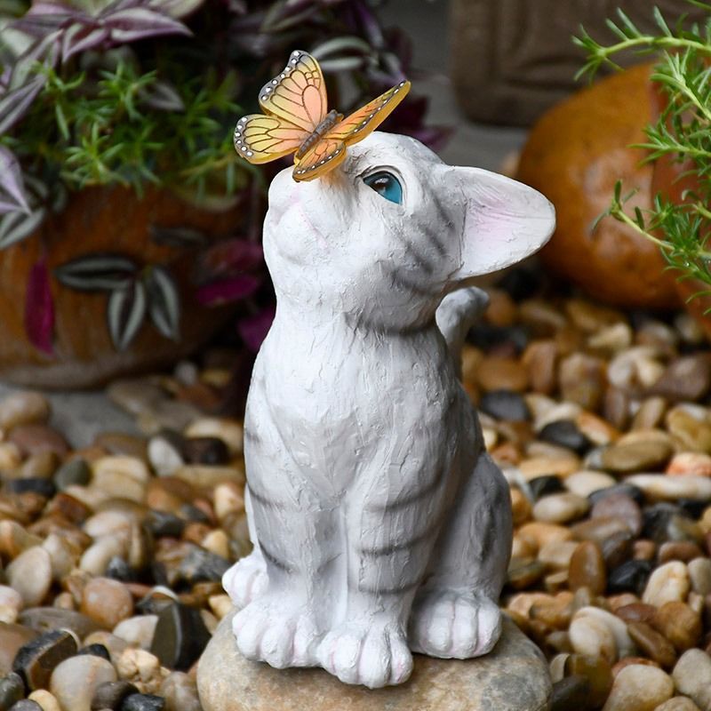 Solar-powered garden gnome sculpture with integrated LED fairy lights and turtle pot