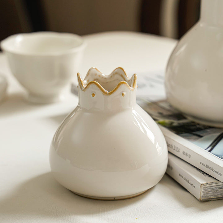 Elegant ceramic vase with wavy edge