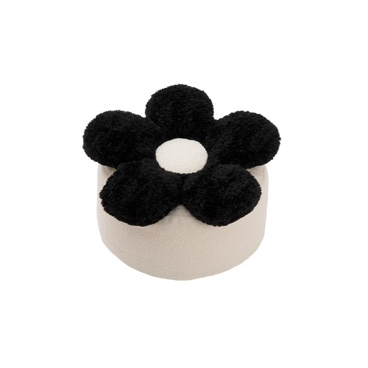 Flower-shaped floor pouf with cuddly teddy fleece surface and removable cover