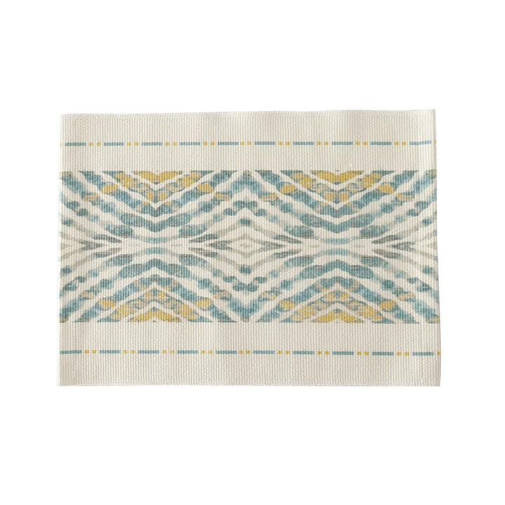 Woven placemat made of cotton blend with geometric diamond trim and fine texture