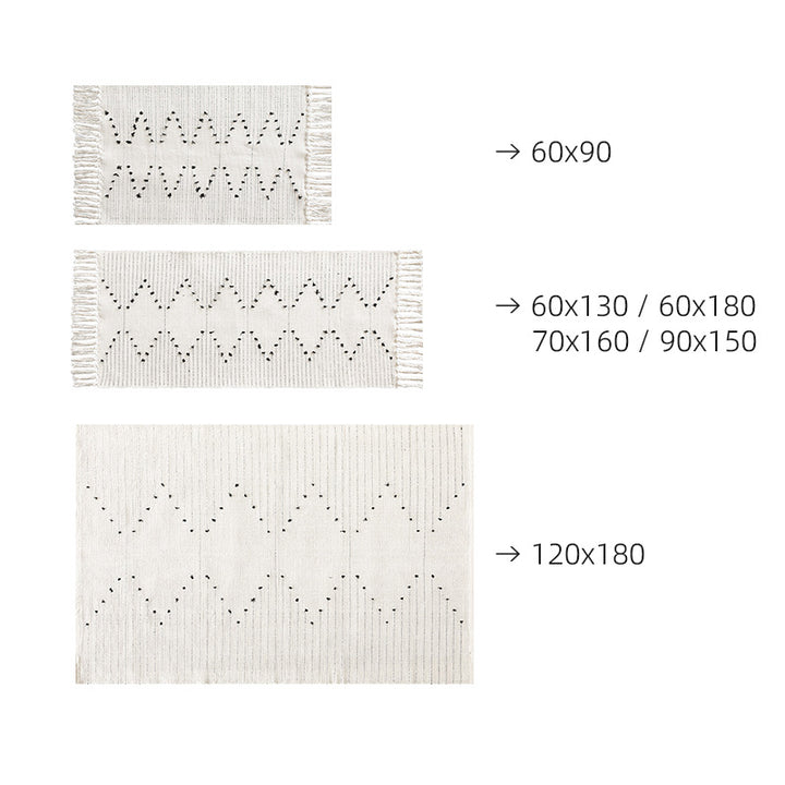 handwoven living room rug with fringes and geometric perforated pattern