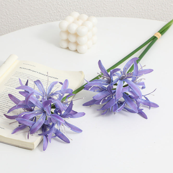 Artificial blossom branch with delicate flowers