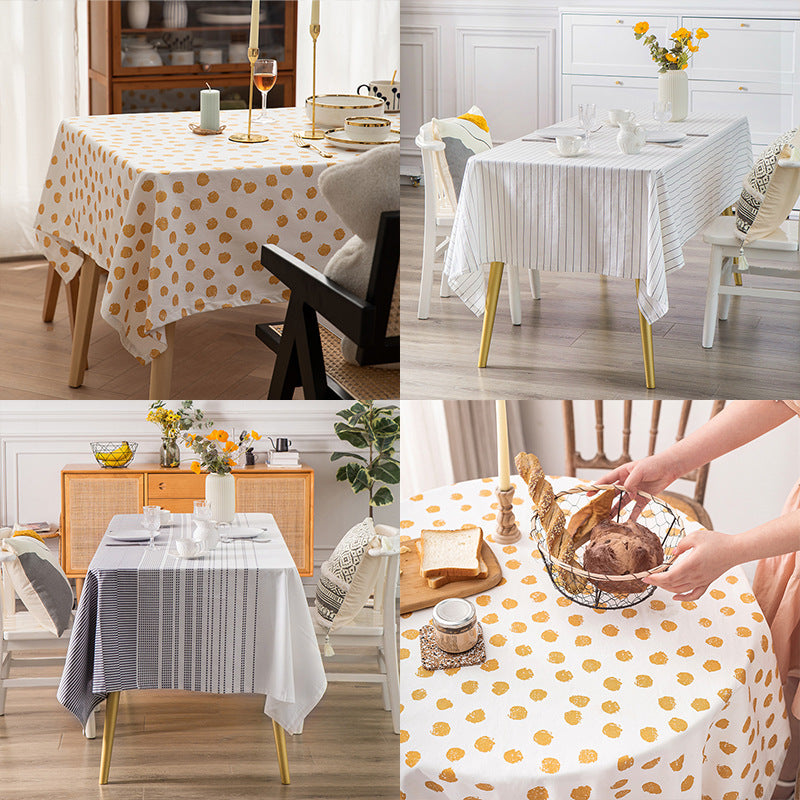 Rectangular tablecloth made of cotton-linen blend with embossed polka dot pattern and water-repellent surface