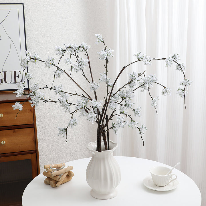 Artificial cherry blossom branch with lifelike details