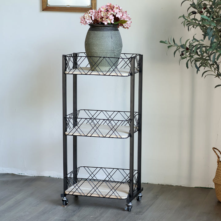 Modern rolling cart with three shelves and wheels