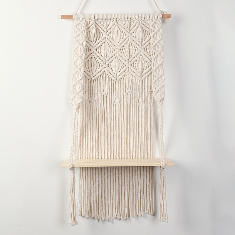 Macramé wall shelf with integrated plant holder