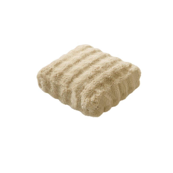 Plush floor cushion pouf with padded filling and faux fur cover