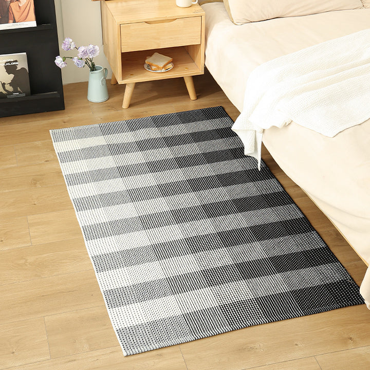 Modern flat-weave area rug with contrasting stripes and non-slip underside