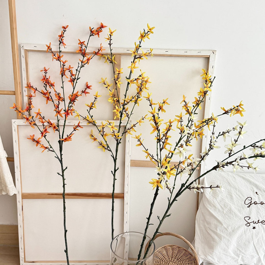 Artificial flower branch with intricately detailed yellow flowers
