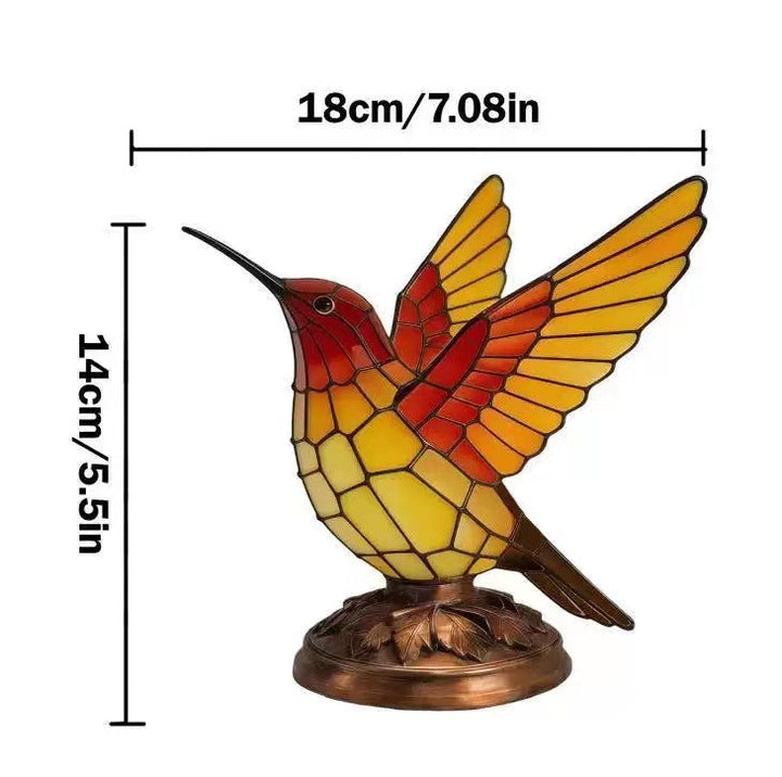 Decorative table lamp in the shape of a hummingbird