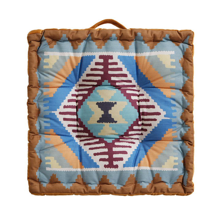 Padded seat and floor cushion with carrying handle and graphic ethno pattern