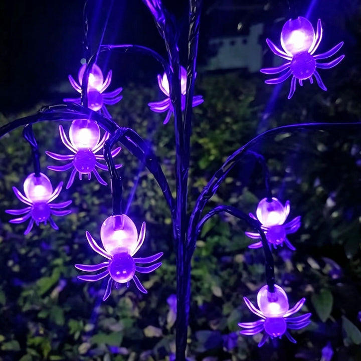 Battery-operated animated bat and spider LED string lights for outdoor Halloween display