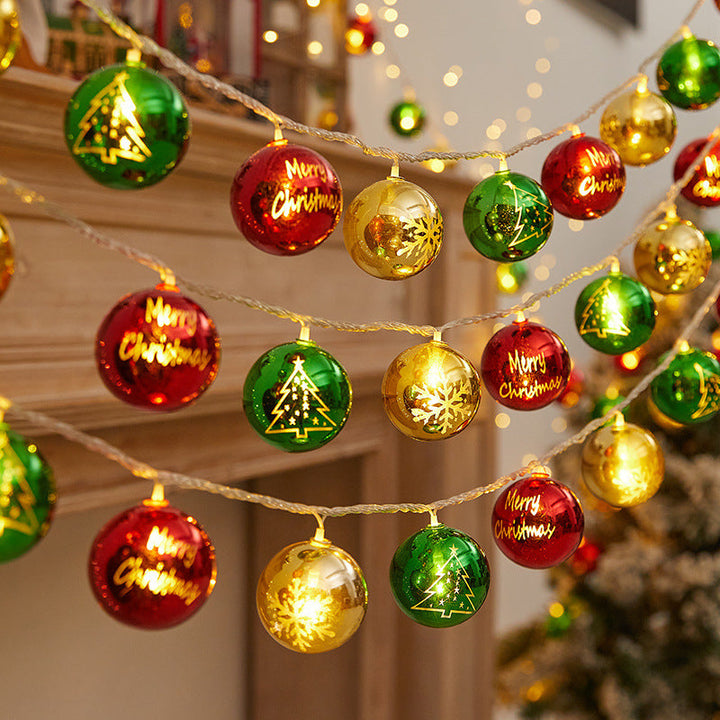 Festive string lights with Christmas ornaments