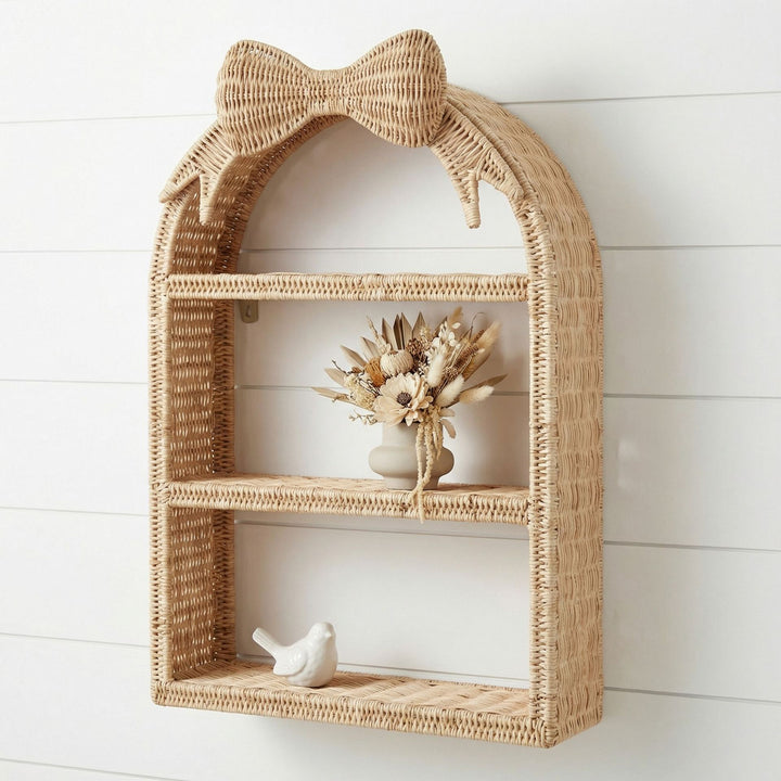 Basket shelf with bow motif