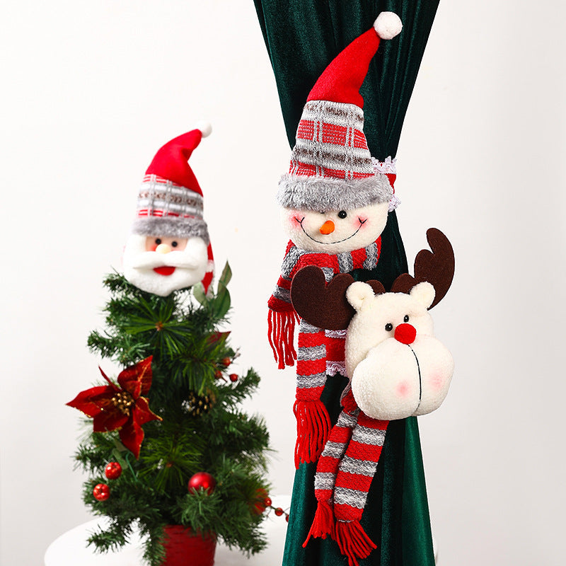 Decorative curtain holder with Christmas moose motif
