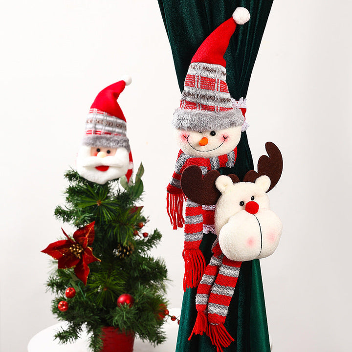 Decorative curtain holder with Christmas moose motif