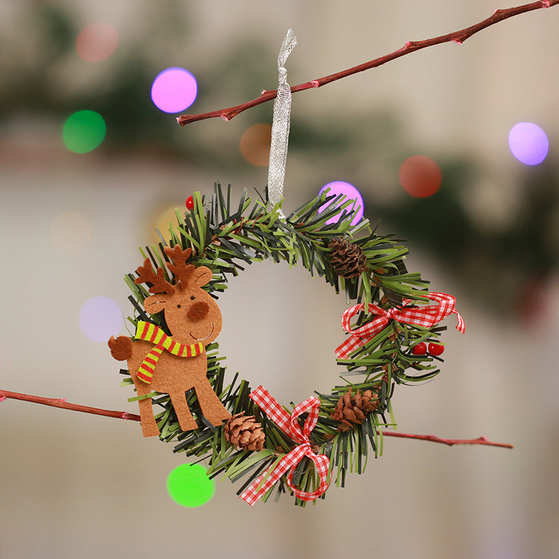 Festive Pine Cone Wreath with Reindeer Decoration