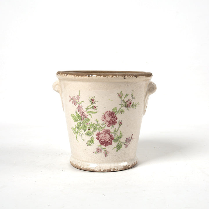 Decorative flower pot with floral embellishments