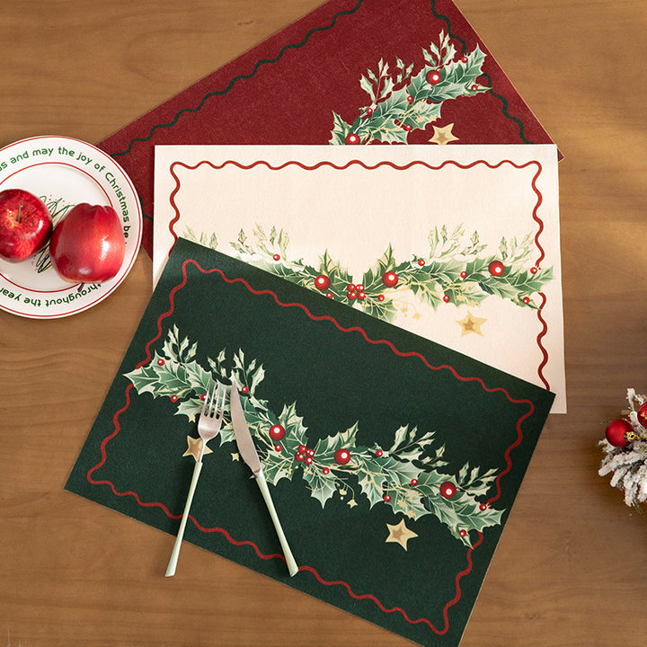 Christmas doormat with lettering and holly motif