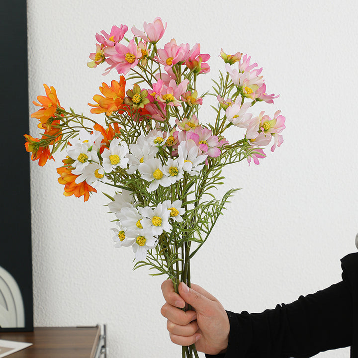 Artificial flower branch with bright pink flowers