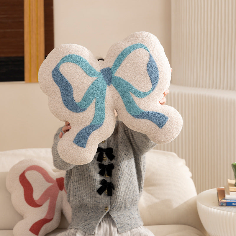 Form pillow in loop design with bouclé cover and soft filling