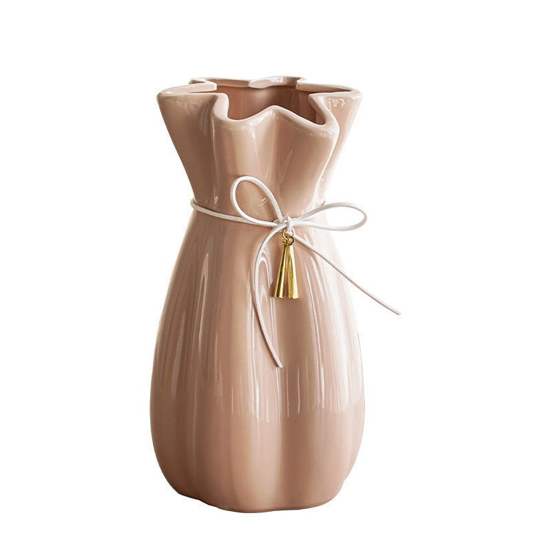 Artistic ceramic vase with decorative bow decoration