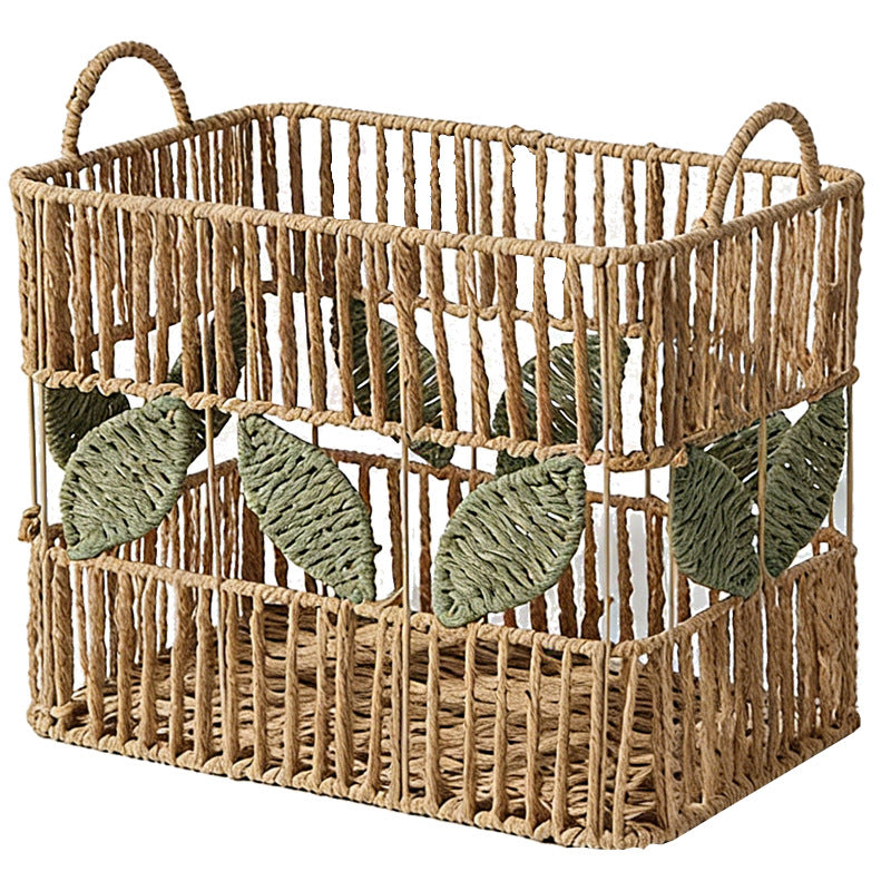 Handcrafted storage basket with leaf motif