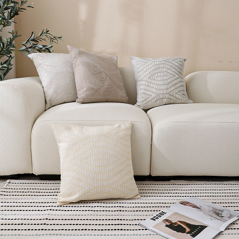 Square sofa decorative cushion with fine woven relief structure and central circle ornament