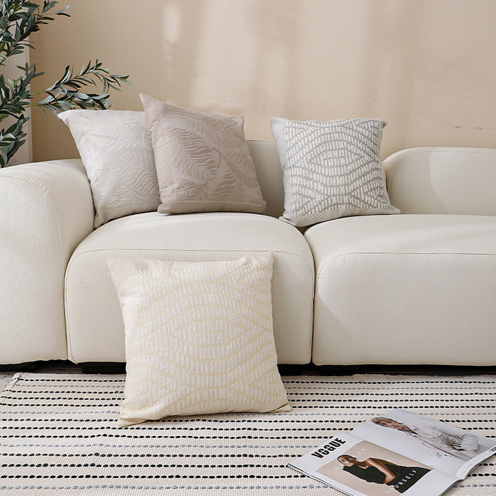 Square sofa decorative cushion with fine woven relief structure and central circle ornament