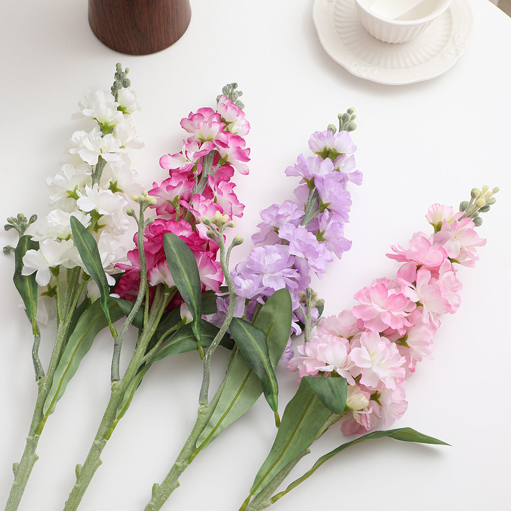 Artificial orchid bouquet with realistic flowers