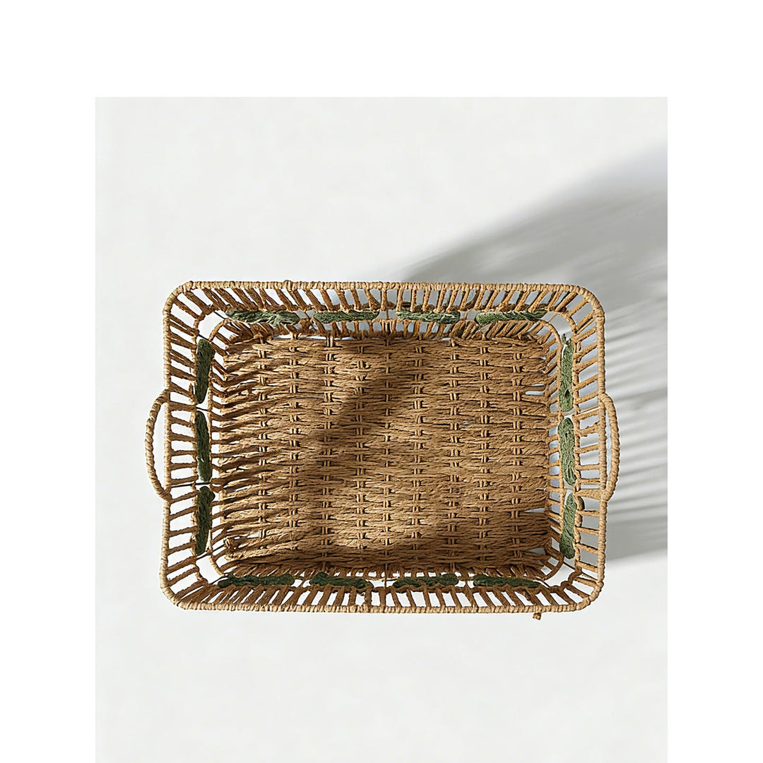 Handcrafted storage basket with leaf motif