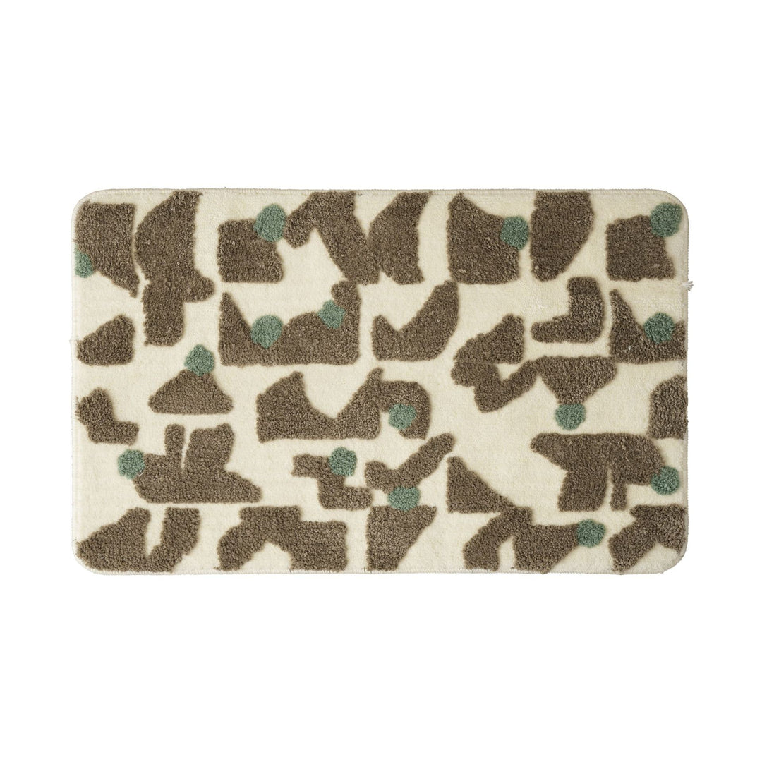 Tufted bathroom mat in abstract leopard pattern with soft high pile