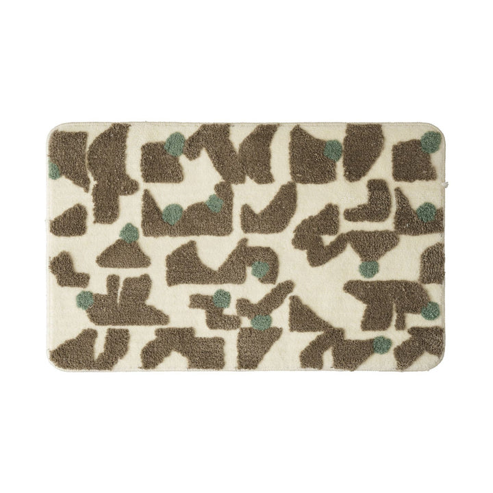 Tufted bathroom mat in abstract leopard pattern with soft high pile