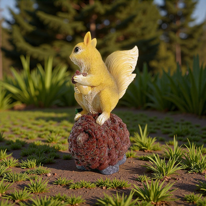 Decorative squirrel sculpture on a pine cone