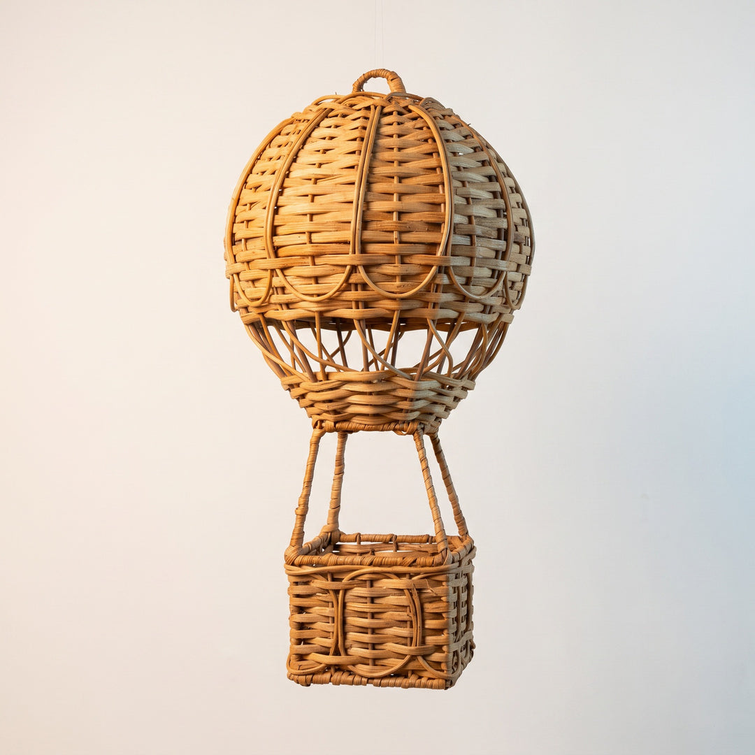 Handwoven storage basket in hot air balloon design