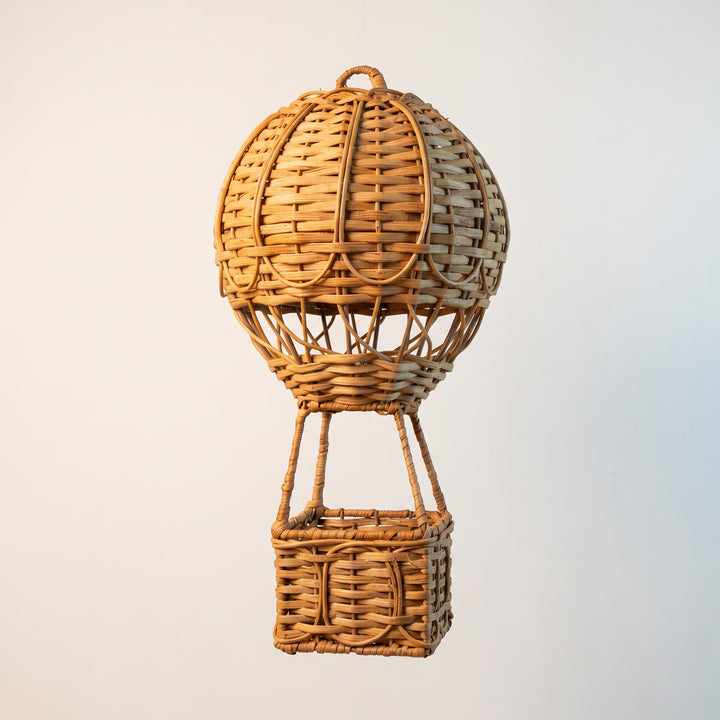 Handwoven storage basket in hot air balloon design