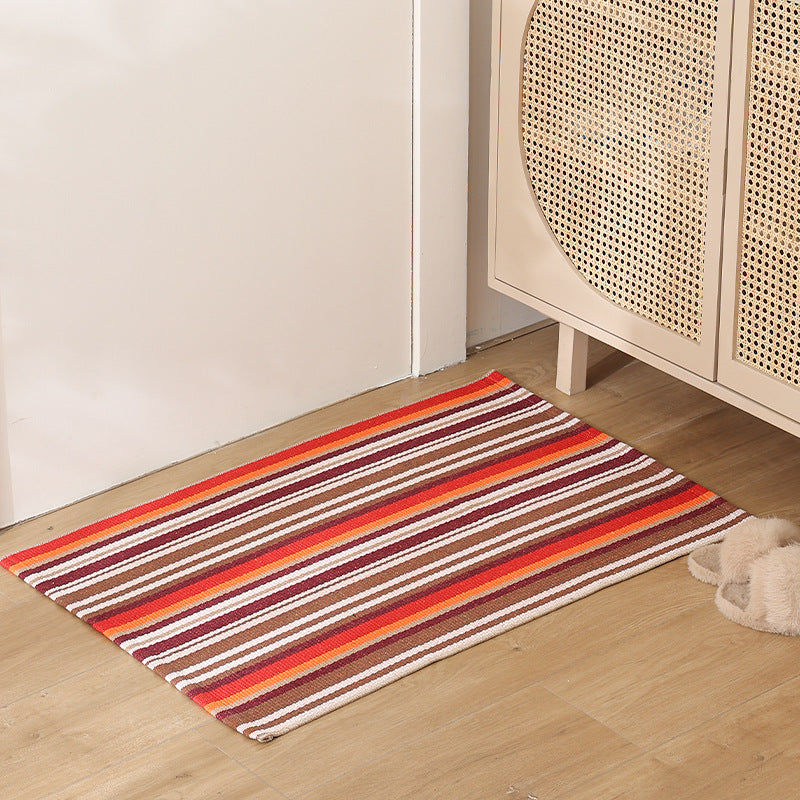 Striped cotton doormat with non-slip bottom and decorative woven edge