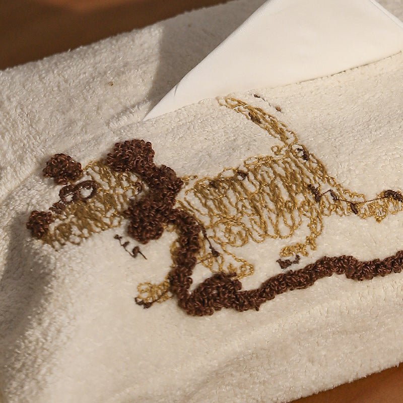 Plush tissue box cover with llama embroidery and decorative fringes