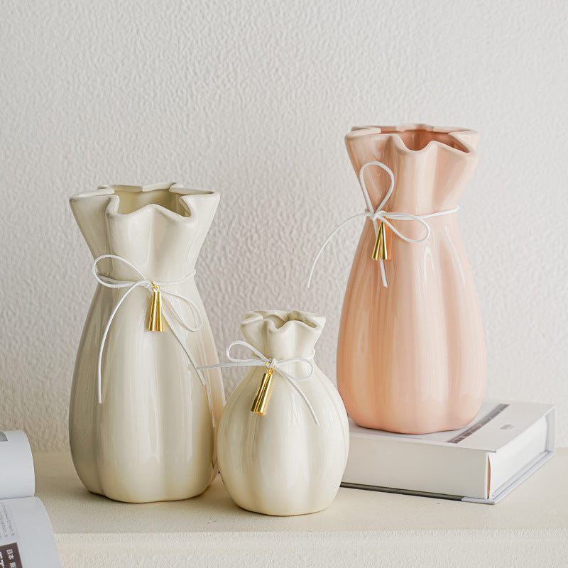 Artistic ceramic vase with decorative bow decoration
