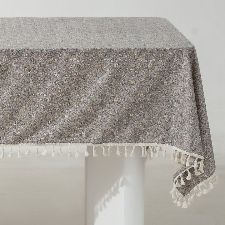 Rectangular tablecloth with floral Millefleurs print and cotton tassels