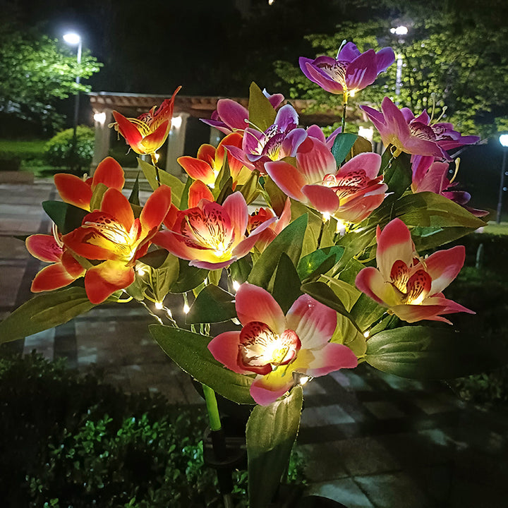 Solar-powered LED decorative flower garden stakes
