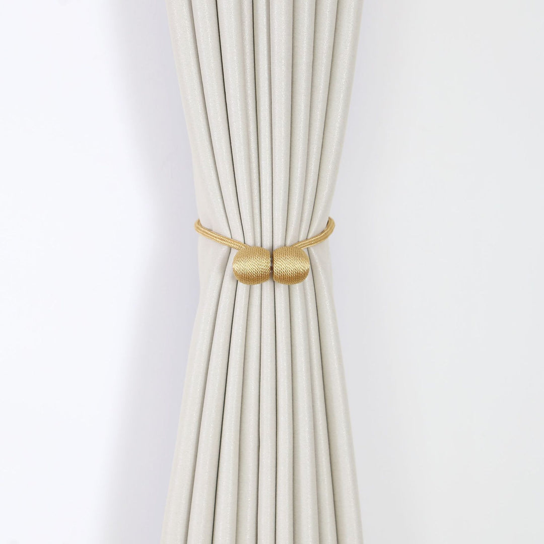 Decorative curtain tieback