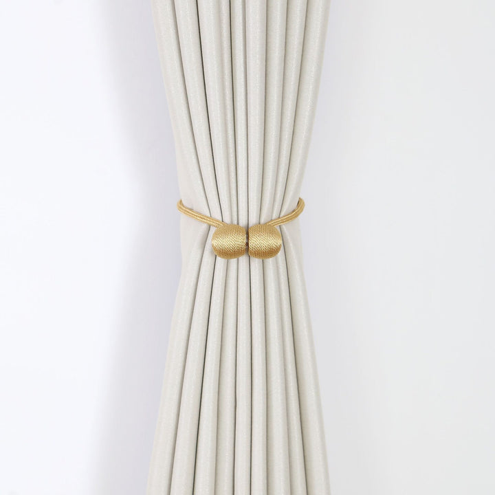 Decorative curtain tieback