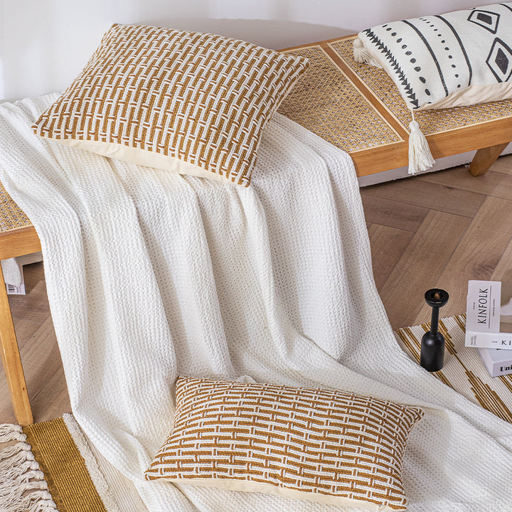 Woven cushion cover in braided look with hidden zipper