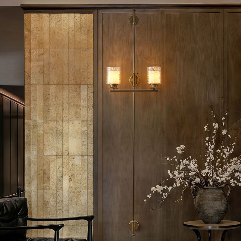 Vertical Brass Dual Glass Cylinder Wall Lamp with Strap Detail